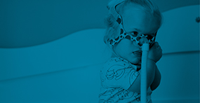 a young girl with Achondroplasia wearing a bipap device